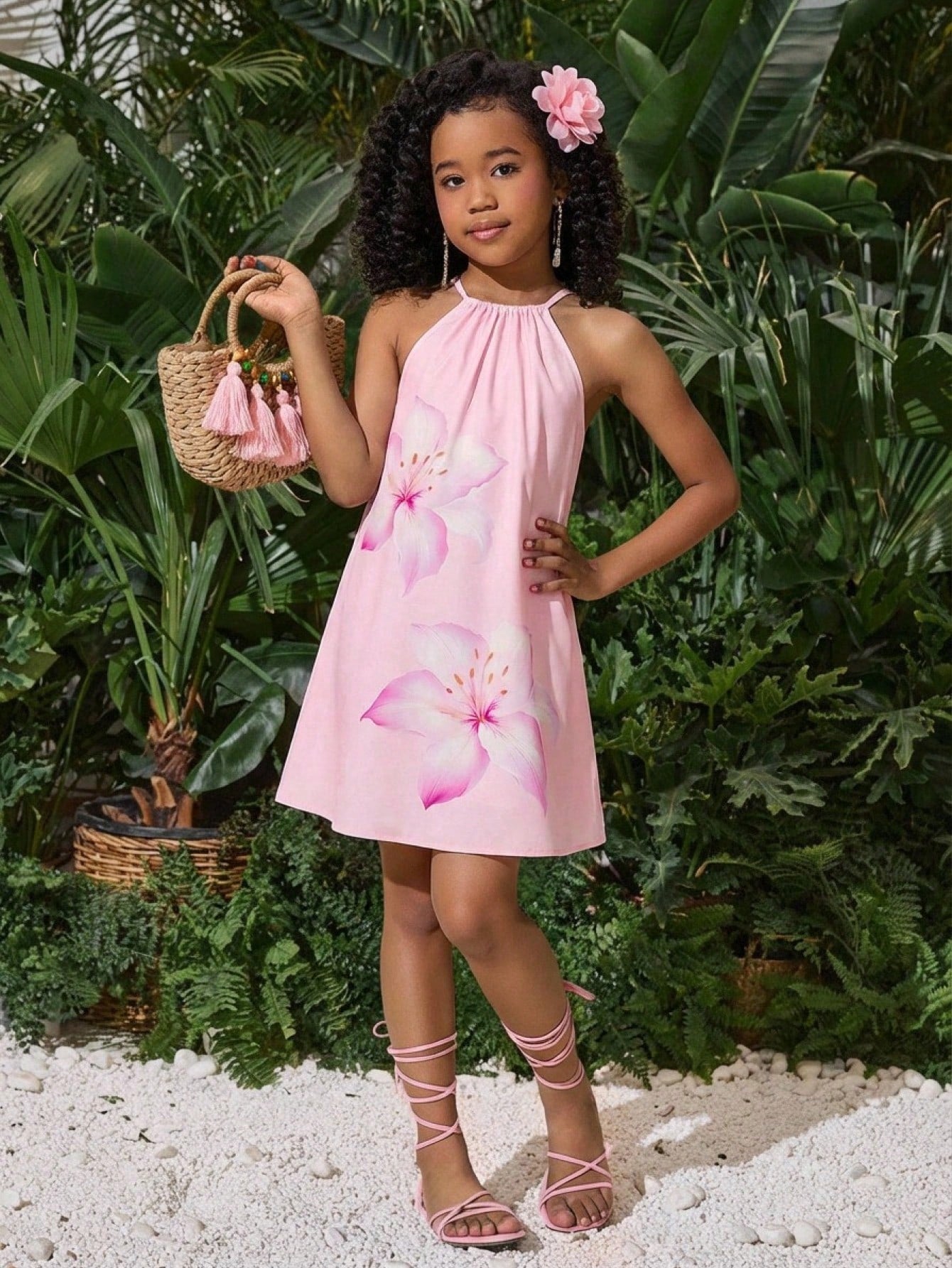 Tween girls floral print dress with halter neckline, sleeveless cold shoulder design, A-line shape, and vacation style.