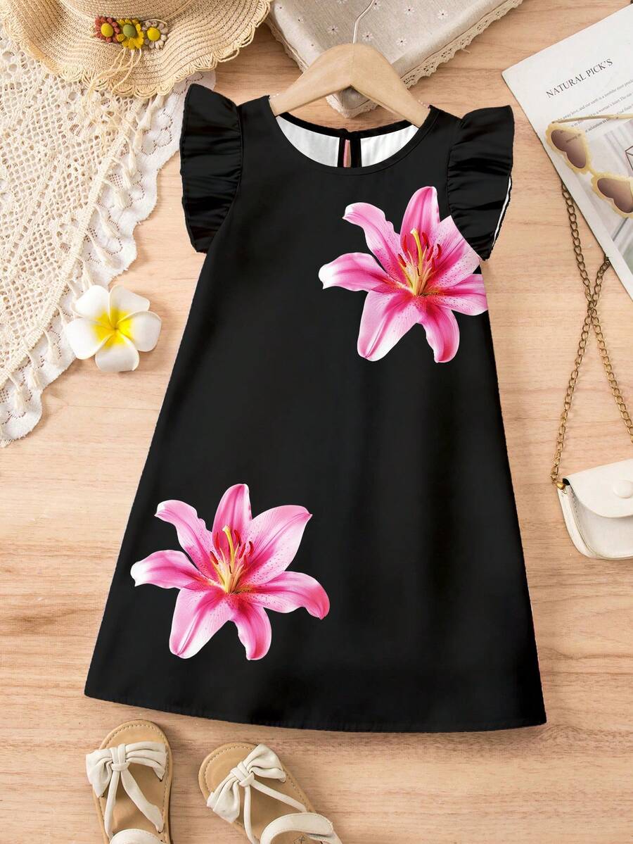 Tween girls sleeveless tropical floral mini dress in black with round neck and ruffle hem detail