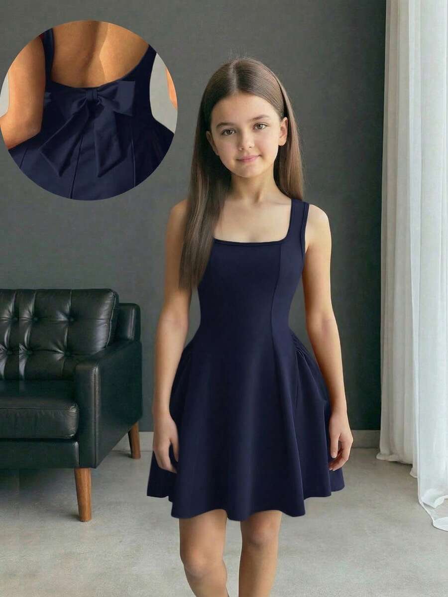 Apricot short-sleeve holiday party dress for tween girls featuring a square neckline, contrast lace details, high waist, flared A-line hem, and bowknot ruffle back detail.