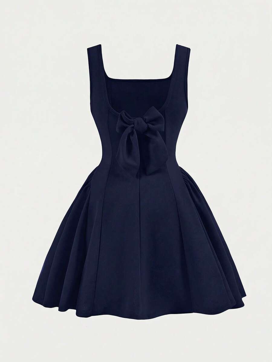 Apricot short-sleeve holiday party dress for tween girls featuring a square neckline, contrast lace details, high waist, flared A-line hem, and bowknot ruffle back detail.