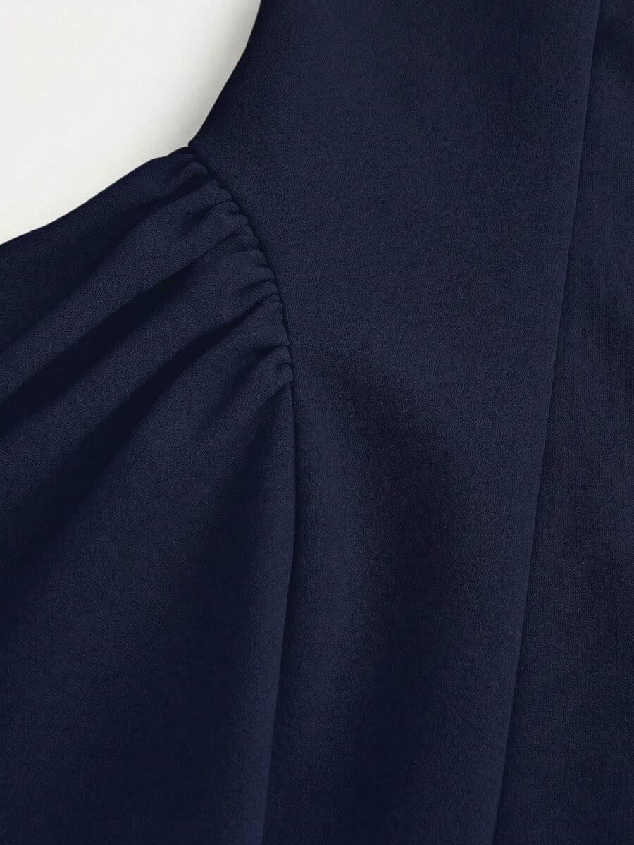 Apricot short-sleeve holiday party dress for tween girls featuring a square neckline, contrast lace details, high waist, flared A-line hem, and bowknot ruffle back detail.