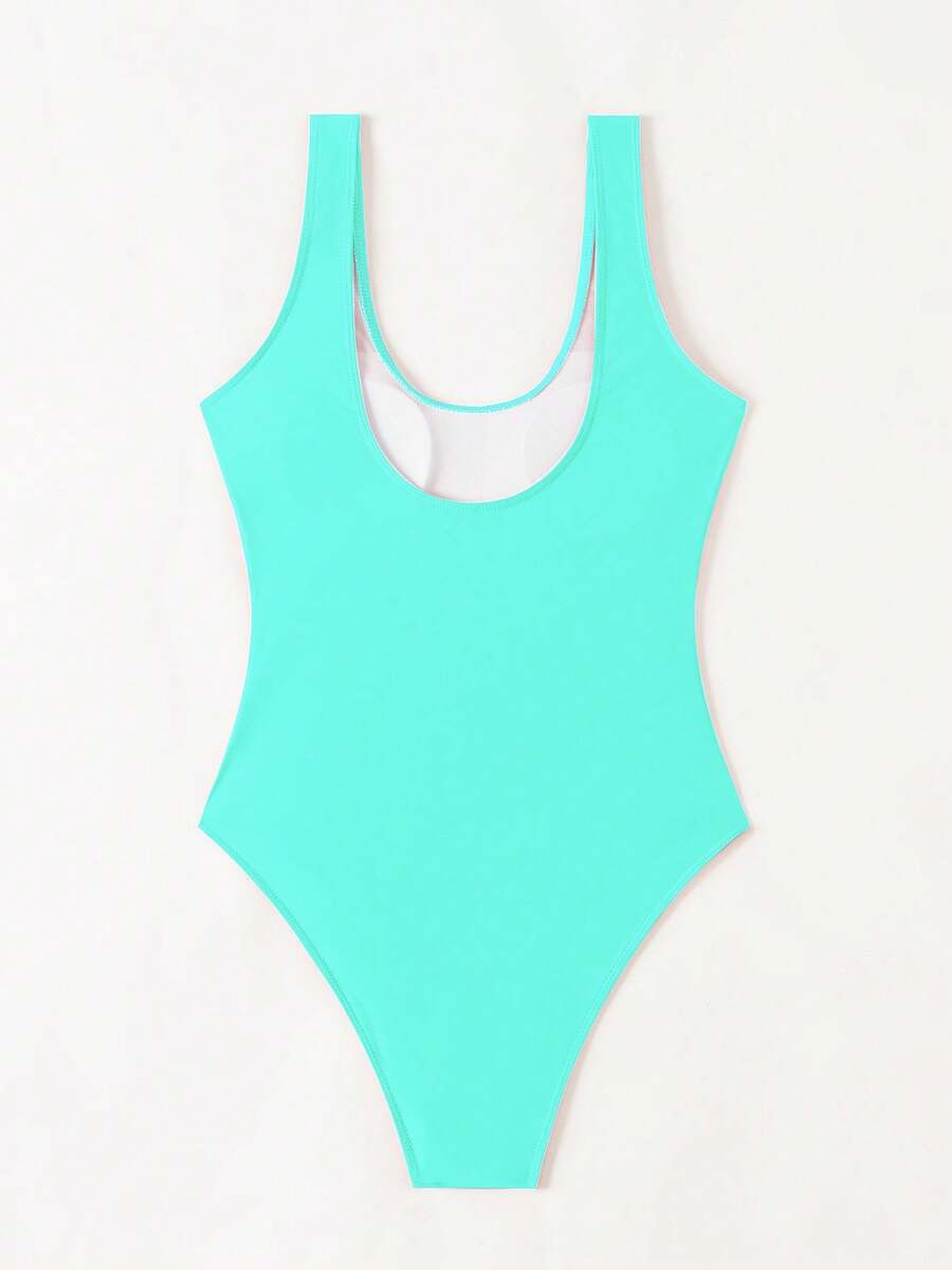 Women's solid color one-piece swimsuit featuring a backless scoop neck design and high cut fit