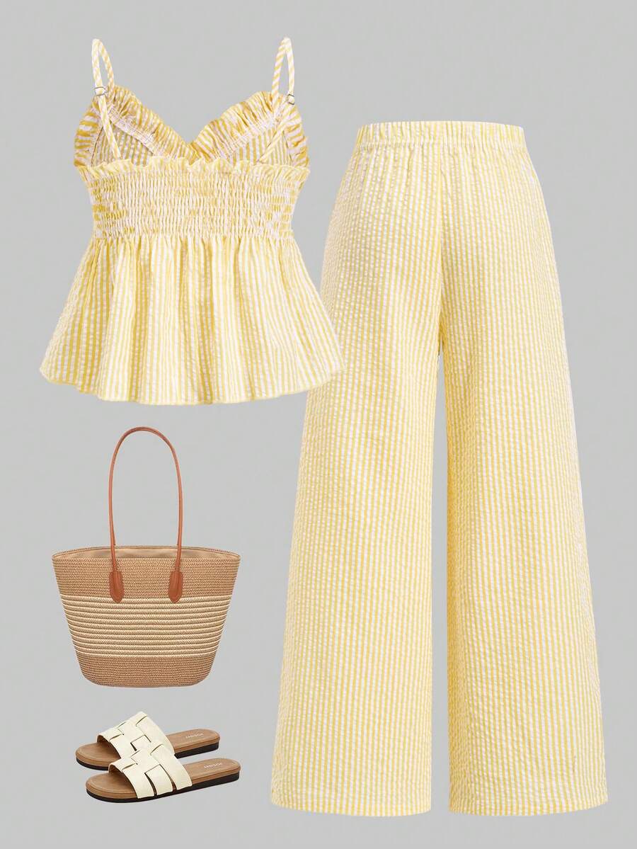 Tween girls 2-piece set featuring a short V-neck ruffle camisole top and matching long pants made of bubble crinkle fabric.
