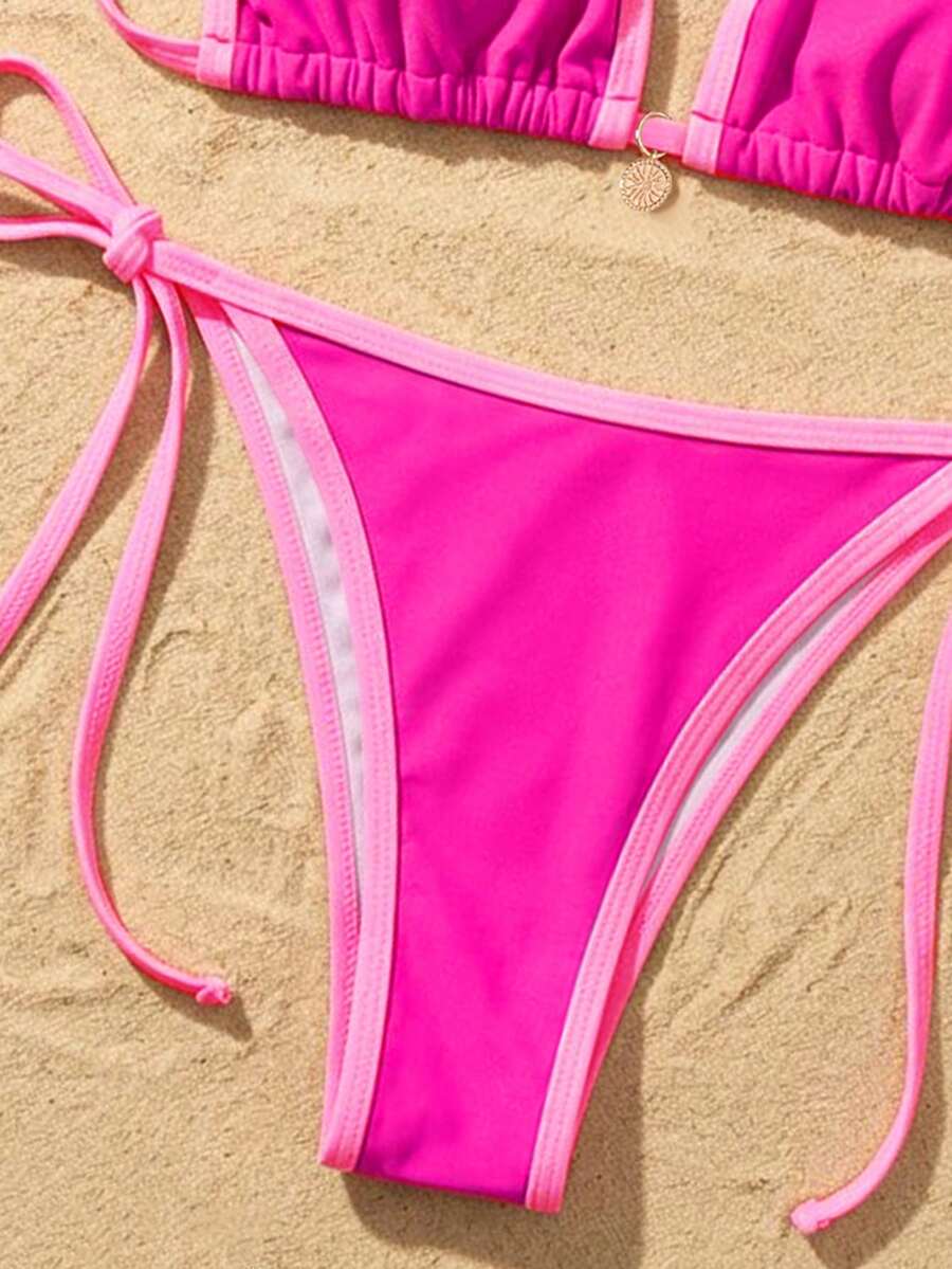Women's high waist 2-piece triangle bikini set featuring colorblock trim, halter neckline, wireless bra with removable padding, and tie-side bottoms.