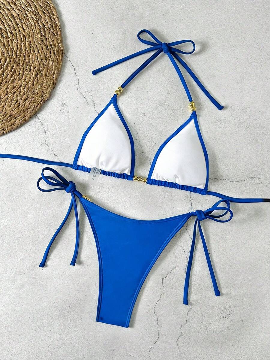 Women's black halter bikini set featuring triangle cups with gold bead decor and tie-back closure