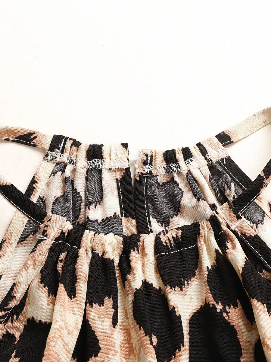 Tween girls floral halter A-line dress with contrast lace, applique and fringe details, sleeveless short length in polyester