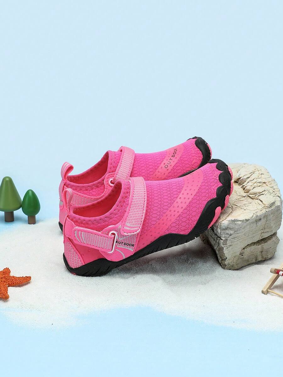 Rose red girls' water shoes with hook and loop closure, rib-knit details, colorblock pattern, and non-slip rubber outsole.