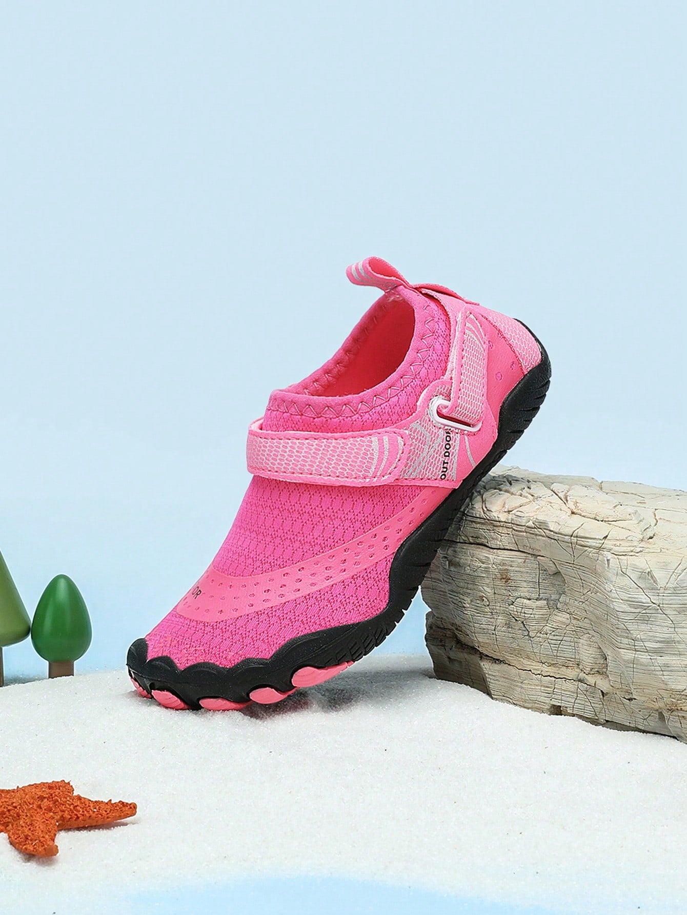 Rose red girls' water shoes with hook and loop closure, rib-knit details, colorblock pattern, and non-slip rubber outsole.