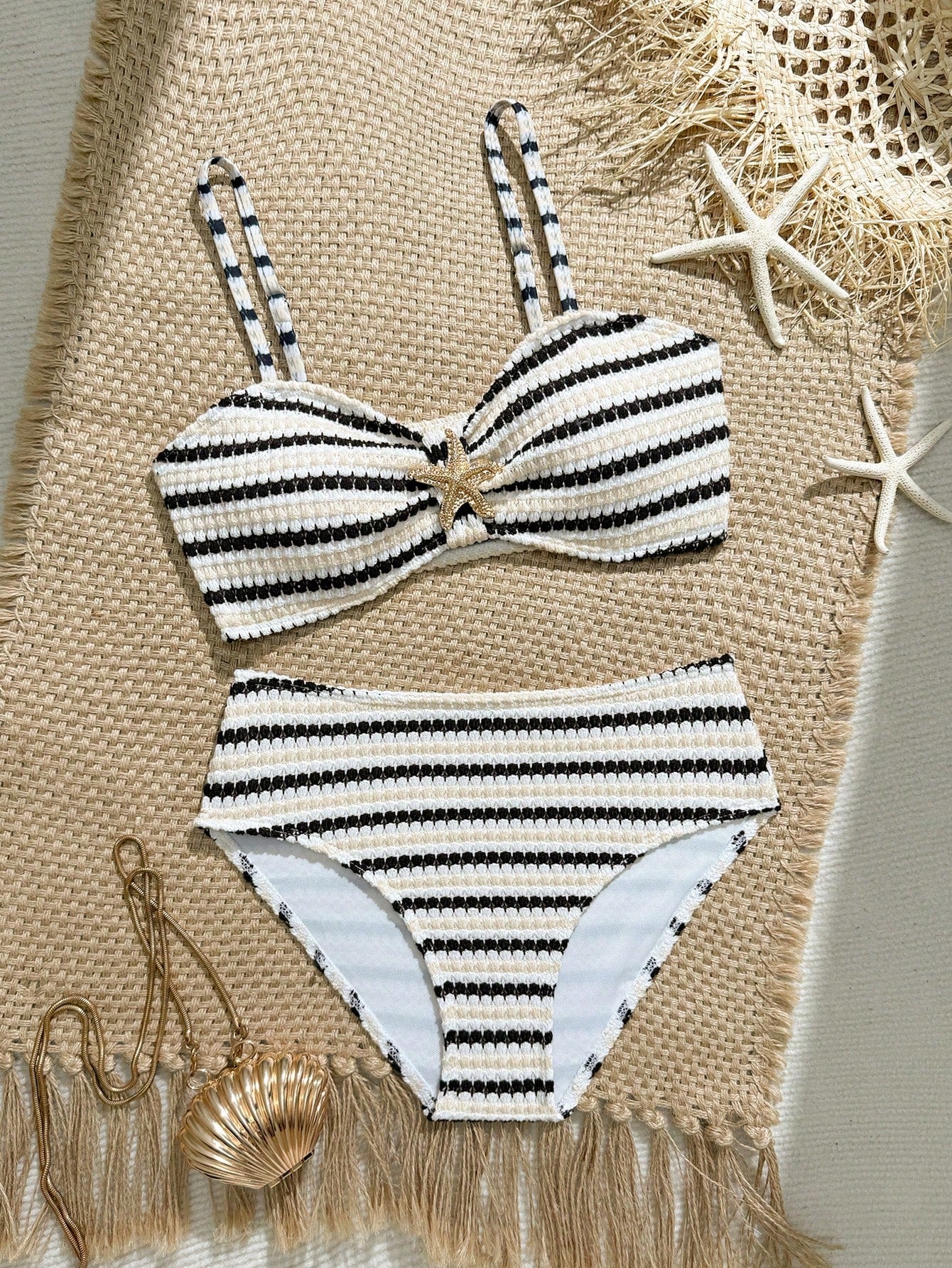 Tween girls pink and white striped two-piece bikini set with spaghetti strap bandeau top, starfish decor, and high waist swim bottoms for beach and vacation wear