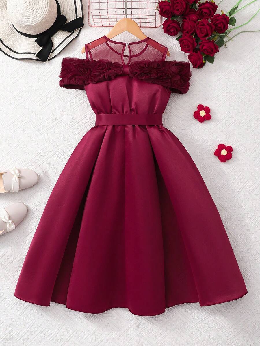 Tween girls dusty blue casual A-line dress with round neck, ruffle accents, high waist, and flared hem.