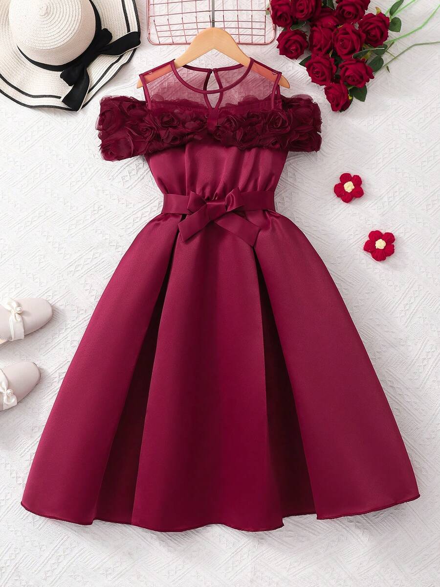 Tween girls dusty blue casual A-line dress with round neck, ruffle accents, high waist, and flared hem.