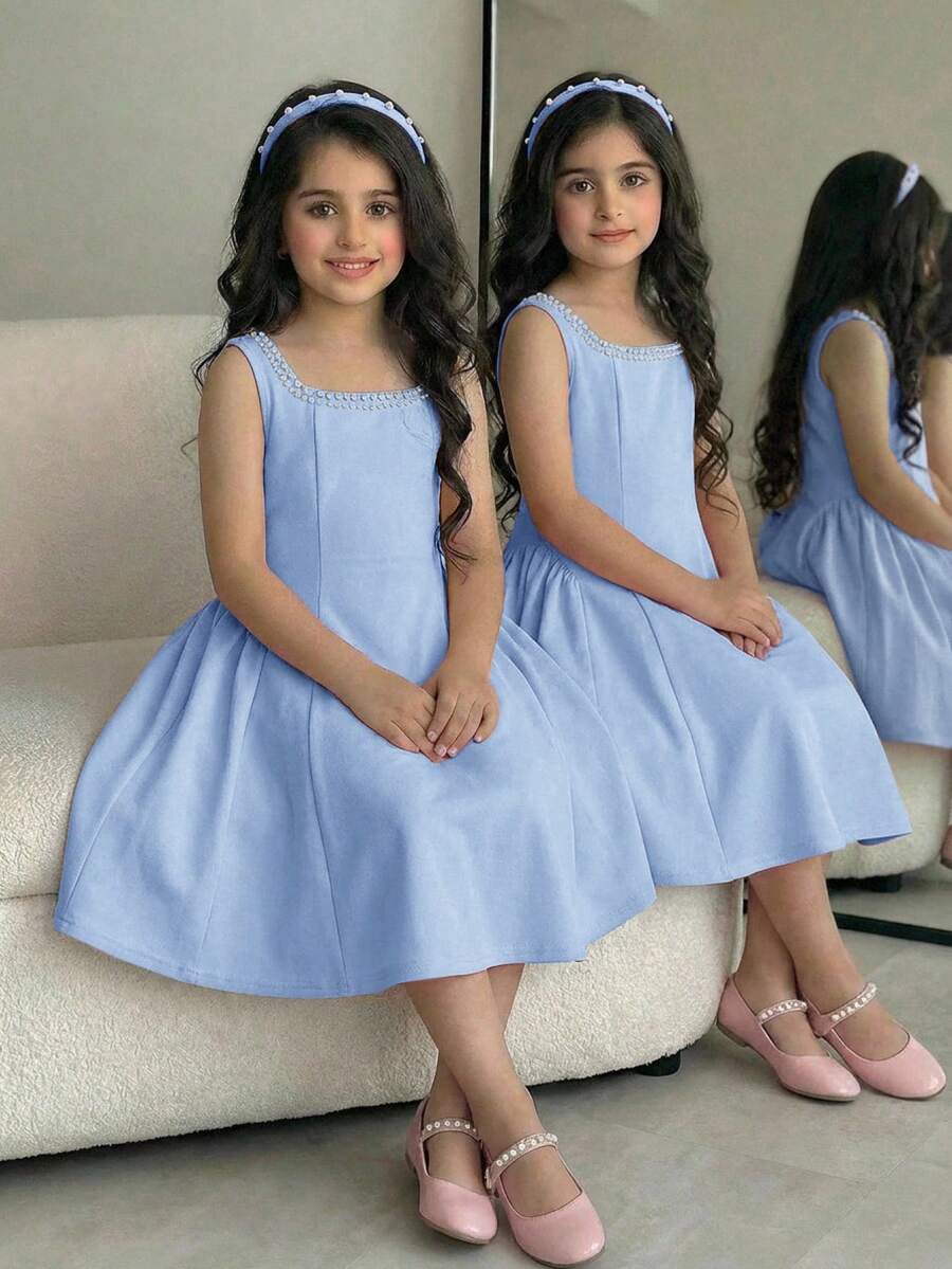 Sleeveless pink square neck A-line dress for tween girls featuring pearl embellishments and a high-waist slim fit design.