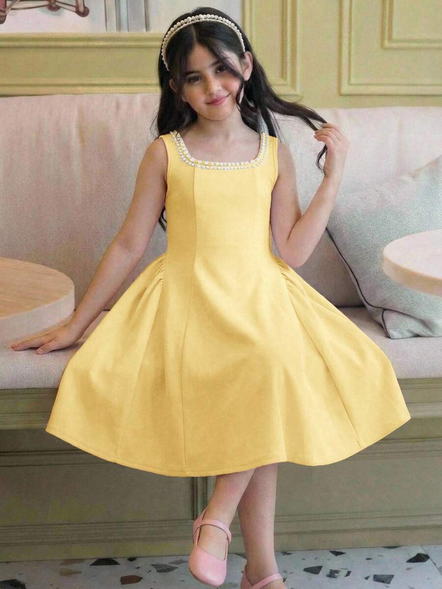Sleeveless pink square neck A-line dress for tween girls featuring pearl embellishments and a high-waist slim fit design.