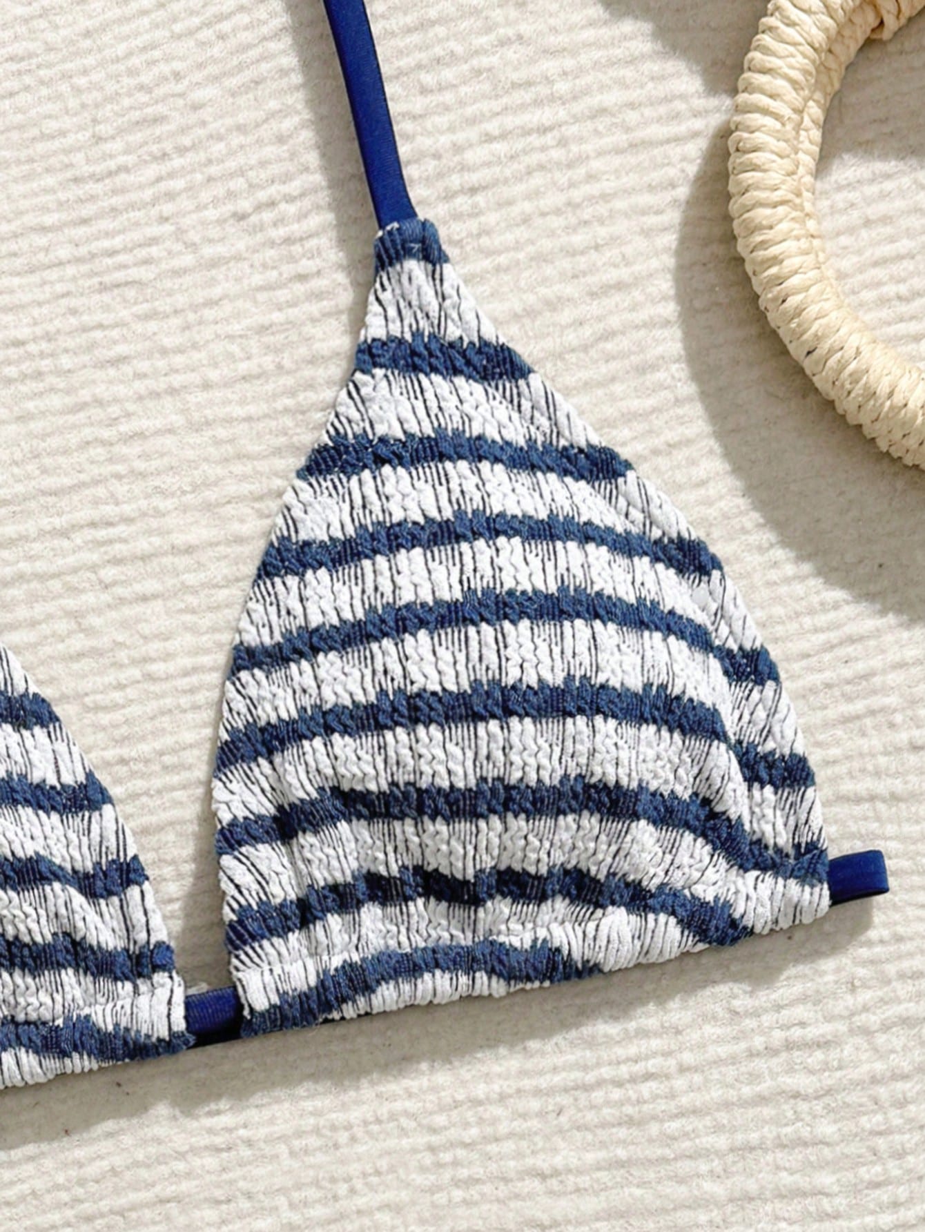 Tween girls blue and white striped two-piece bikini set with halter triangle top and mid-waist short bikini bottoms for beach and vacation swimwear.