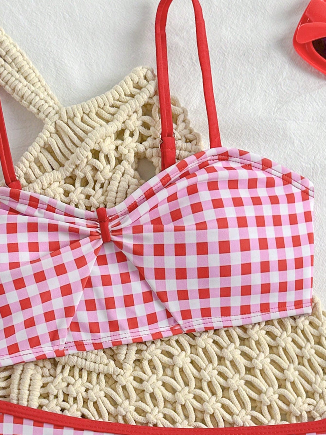Tween girls 2-piece ditsy floral bikini set featuring a spaghetti strap top with center string detail and matching bottoms with side strings, designed for swimming, vacation, and summer wear.