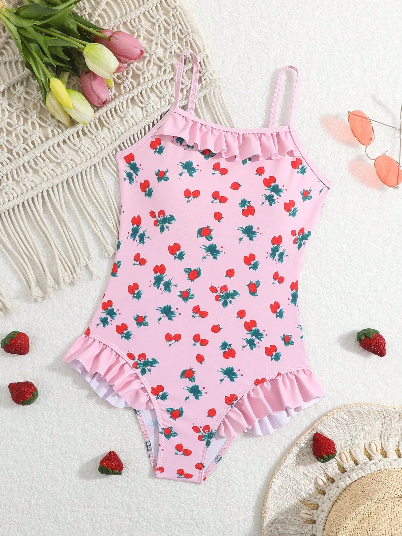 Tween girl plaid all-over print one-piece swimsuit with ruffle detail, spaghetti straps, fitted shape, and multicolor patchwork style for beach or pool wear.