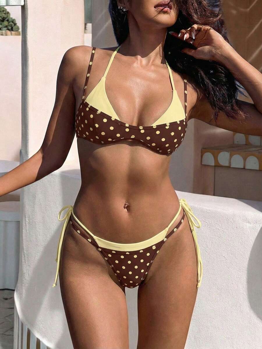 Women's retro polka dot high waist bikini swimsuit set with spaghetti straps and knot tie-back top.