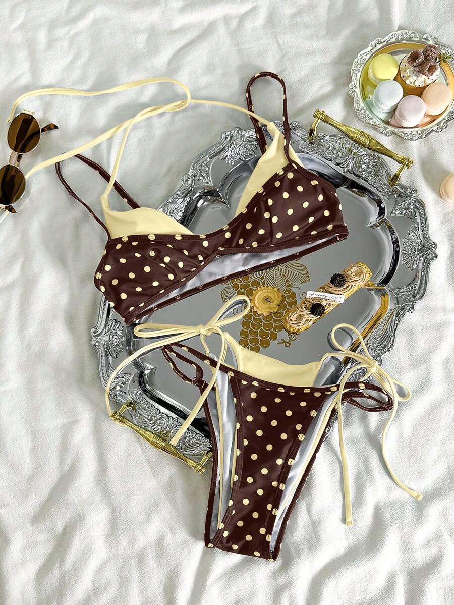 Women's retro polka dot high waist bikini swimsuit set with spaghetti straps and knot tie-back top.