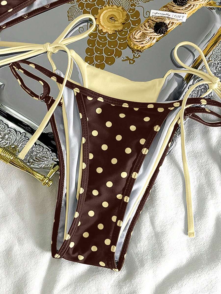 Women's retro polka dot high waist bikini swimsuit set with spaghetti straps and knot tie-back top.