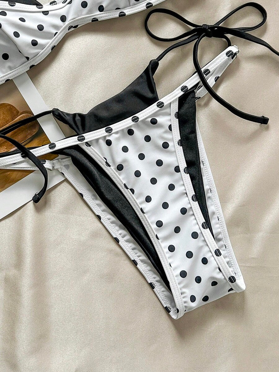 Women's retro polka dot high waist bikini swimsuit set with spaghetti straps and knot tie-back top.