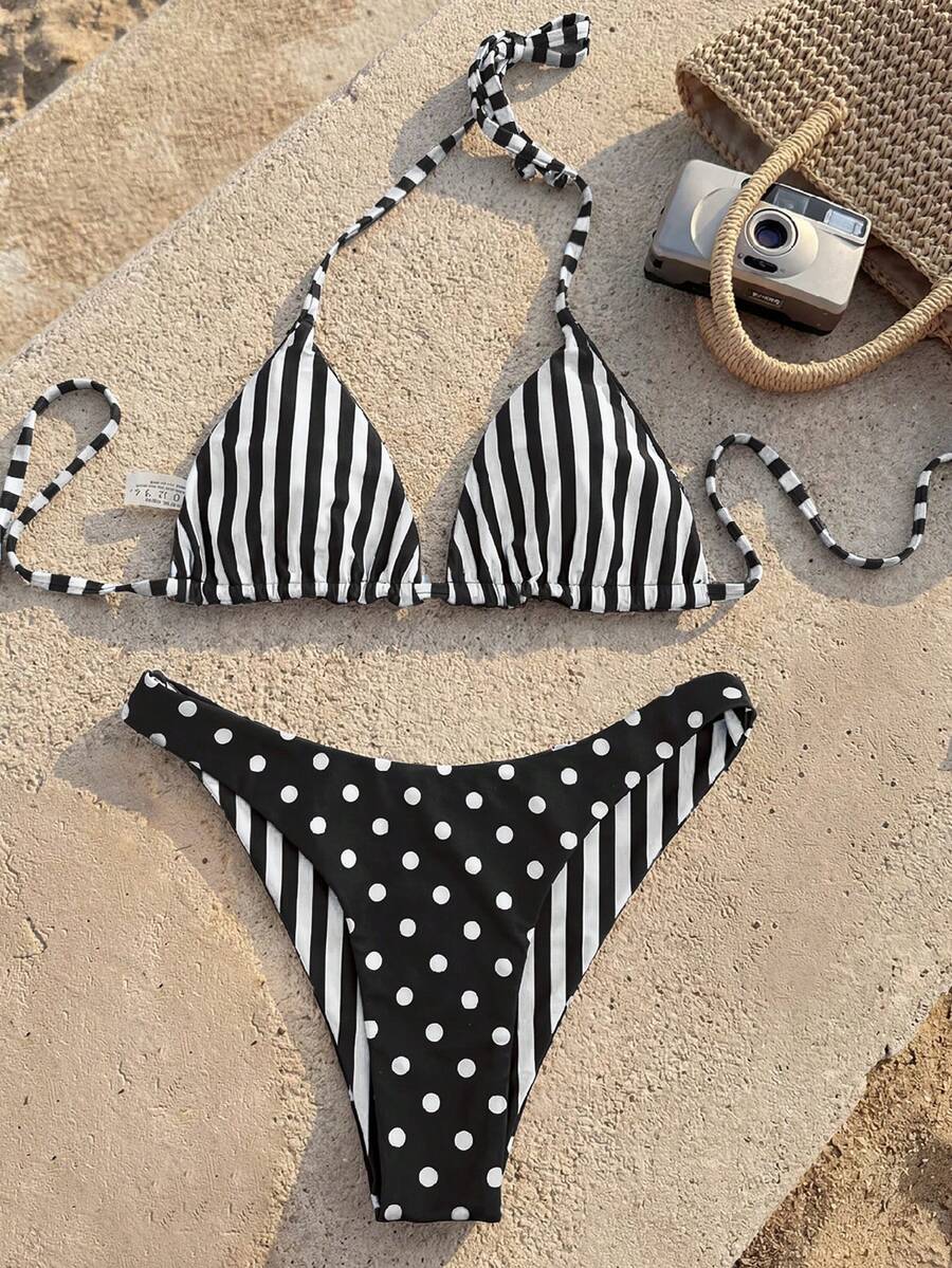 Women's two-piece halter bikini set featuring high cut thong bottoms and removable padding