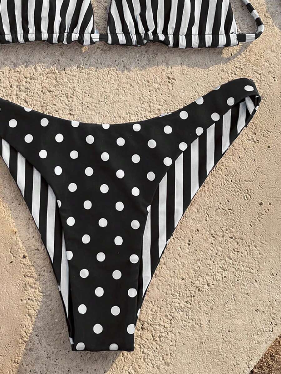 Women's two-piece halter bikini set featuring high cut thong bottoms and removable padding
