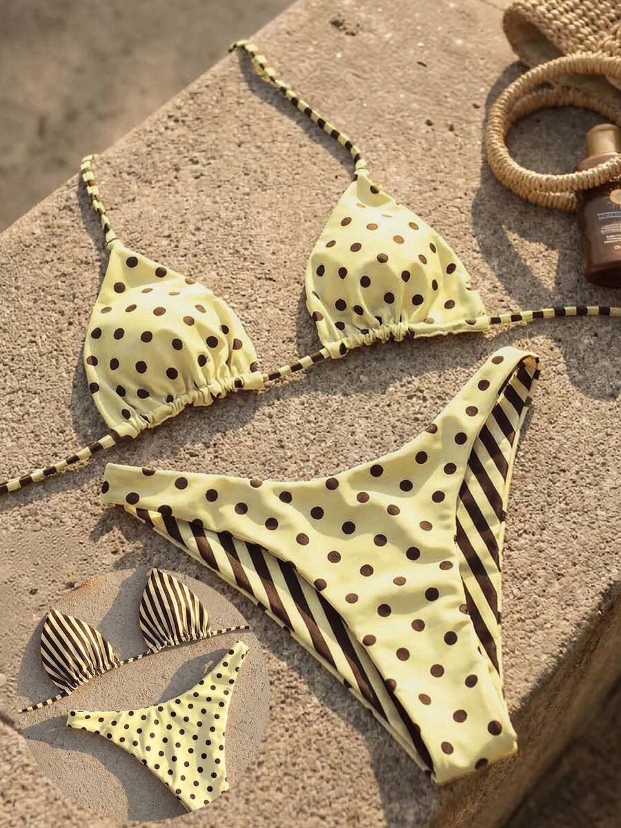 Women's two-piece halter bikini set featuring high cut thong bottoms and removable padding