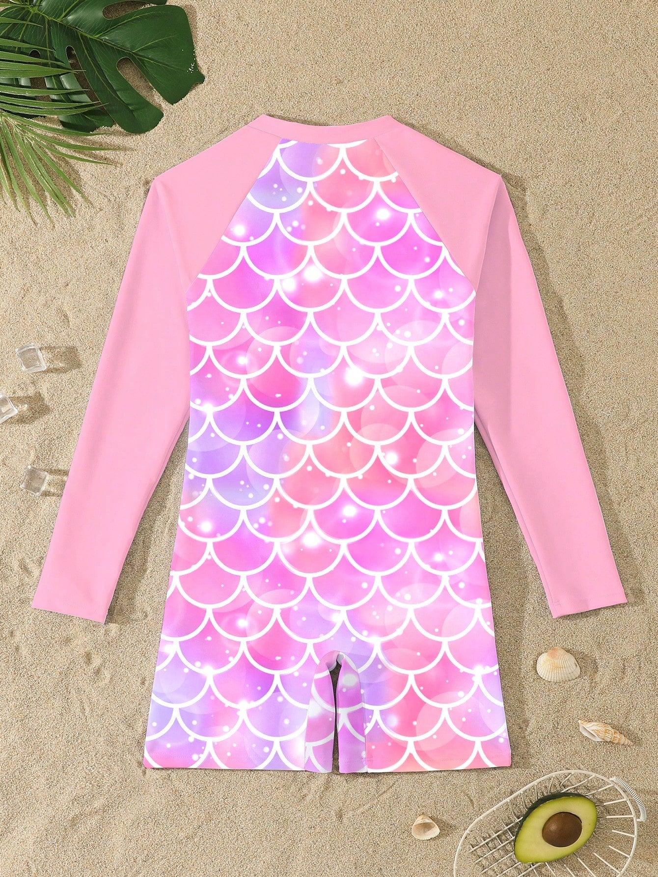 Tween girls one-piece swimsuit featuring a high neck, long sleeves, and shorts bottom, with a back zipper and strawberry plaid digital print on stretch knit fabric. Designed for swimming, vacation, and summer wear.