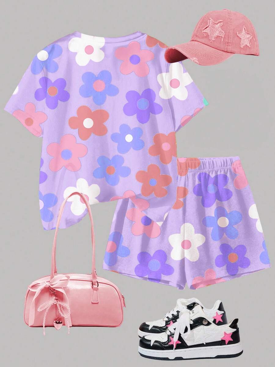 Tween girls multicolor tie-dye 2-piece outfit set featuring a drop-shoulder short-sleeve t-shirt and matching loose track shorts with side pockets.