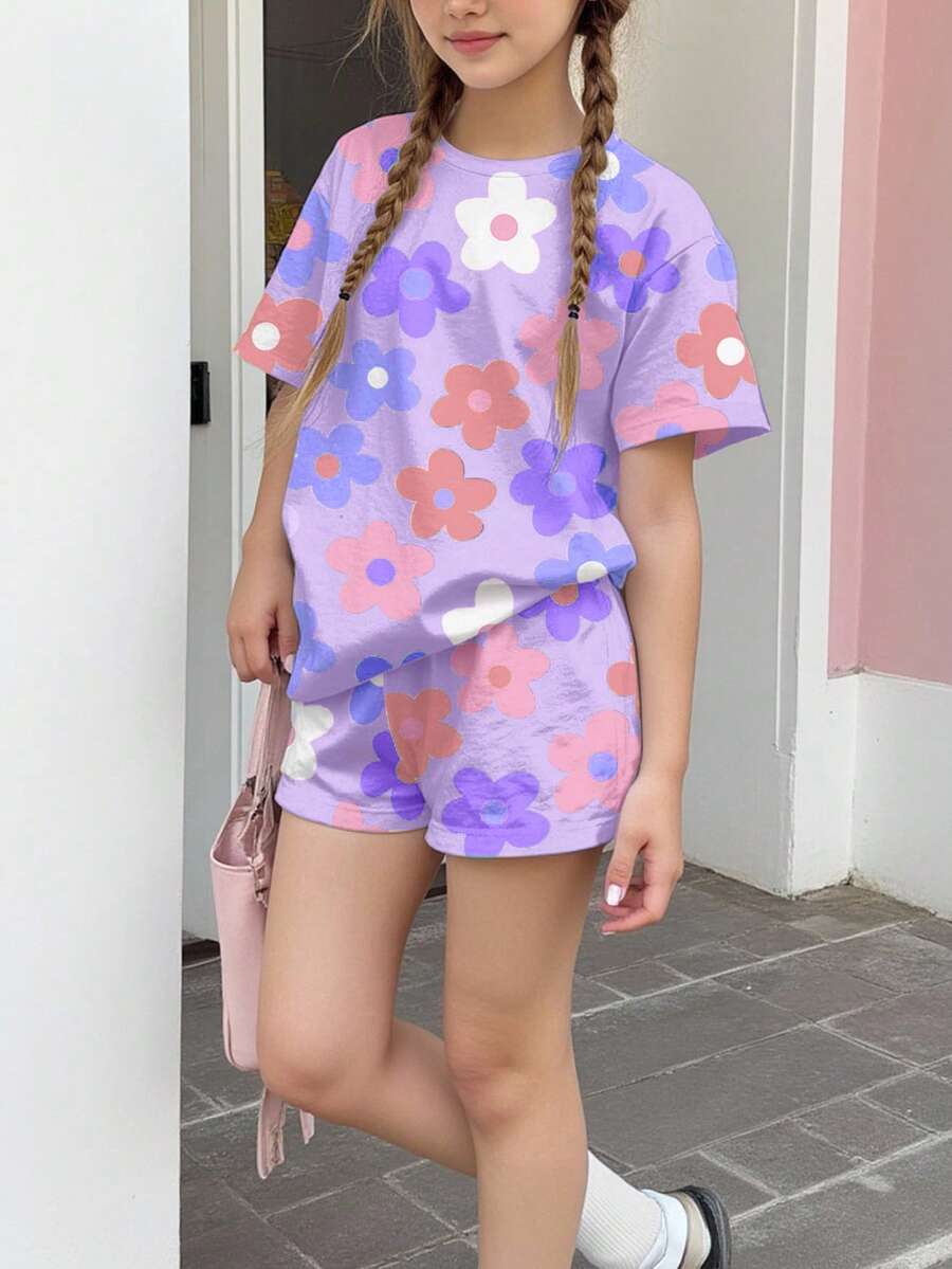 Tween girls multicolor tie-dye 2-piece outfit set featuring a drop-shoulder short-sleeve t-shirt and matching loose track shorts with side pockets.