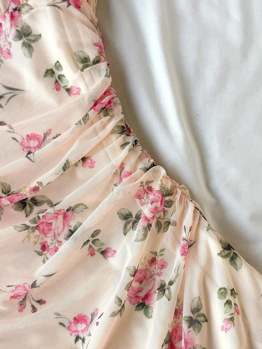 Teen girls red floral print A-line party dress featuring short puff sleeves, square neckline, ruched bust, and contrast lace details.