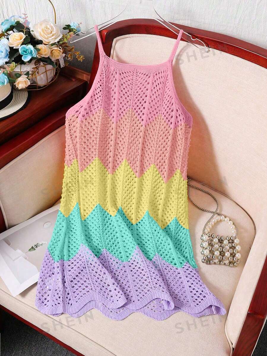 Girls' multicolor rainbow gradient crochet beach cover up with hollow-out knit design, spaghetti straps, sleeveless A-line shape, and semi-sheer finish.
