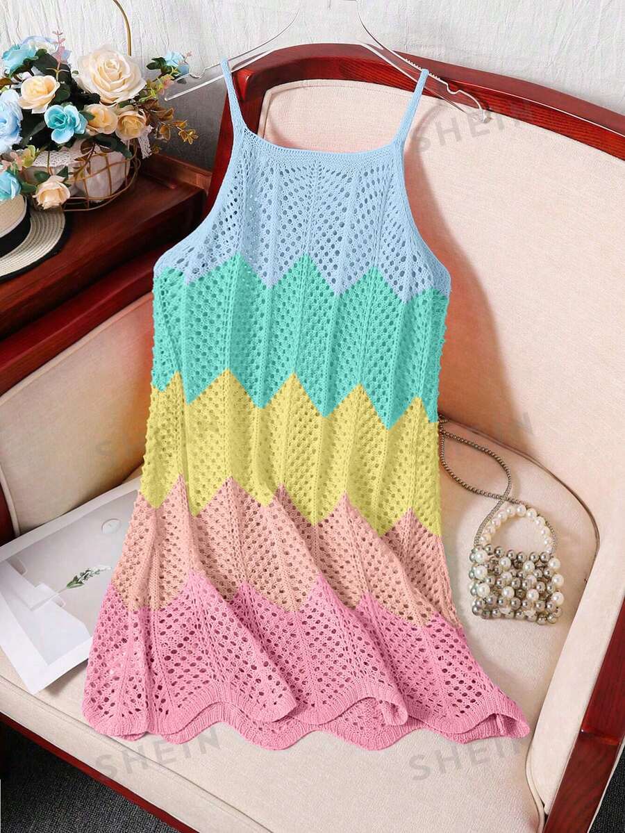 Girls' multicolor rainbow gradient crochet beach cover up with hollow-out knit design, spaghetti straps, sleeveless A-line shape, and semi-sheer finish.