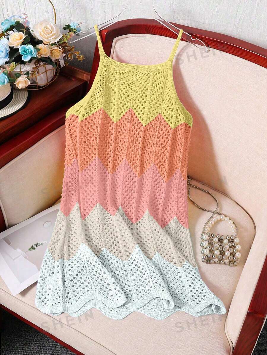 Girls' multicolor rainbow gradient crochet beach cover up with hollow-out knit design, spaghetti straps, sleeveless A-line shape, and semi-sheer finish.