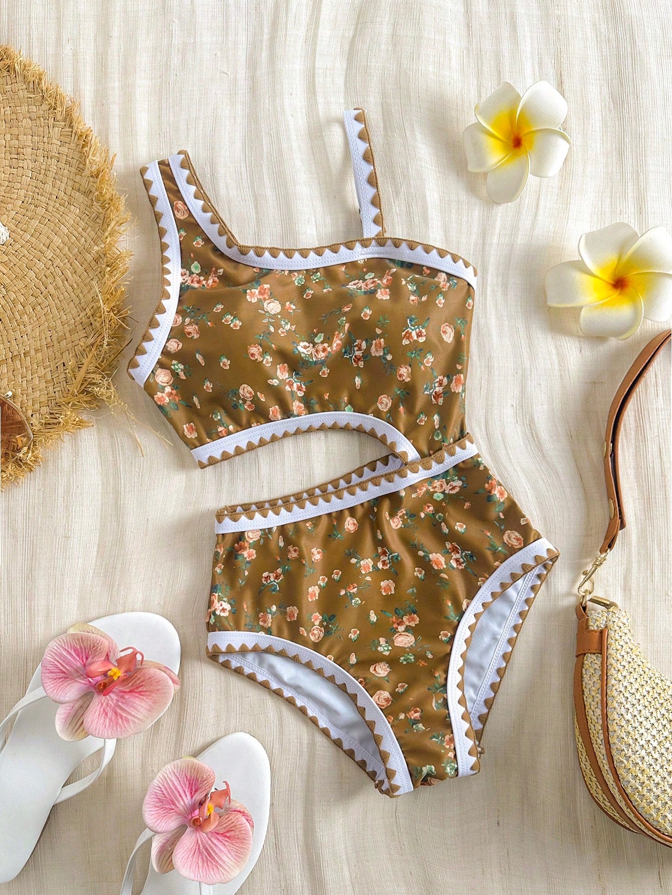 Tween girls one-piece swimsuit featuring an asymmetric neckline, pendant decor, plain design, wireless bra, high-cut bottom, and medium-stretch fabric.