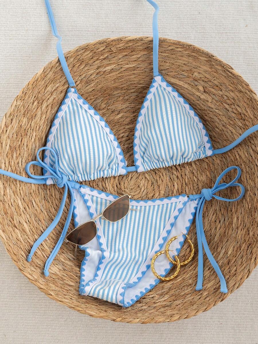 Women's triangle bikini set with contrast lace wireless bra top and ultra high waist tie side bottoms.