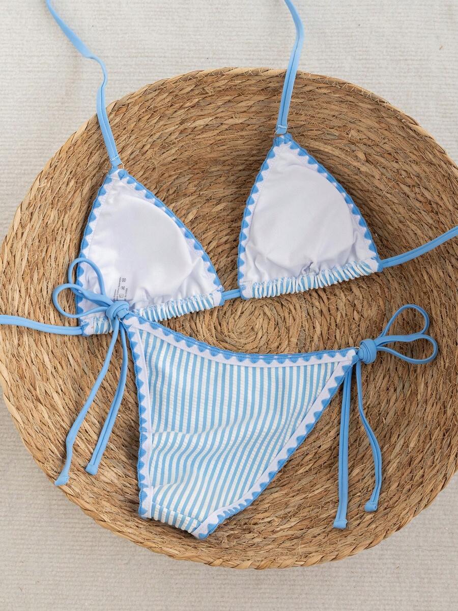 Women's triangle bikini set with contrast lace wireless bra top and ultra high waist tie side bottoms.