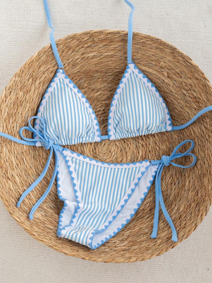 Women's triangle bikini set with contrast lace wireless bra top and ultra high waist tie side bottoms.