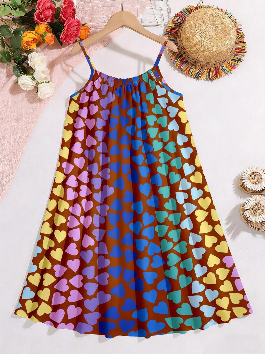 Multicolor geometric print cami midi dress for tween girls featuring spaghetti straps and a flared hem.
