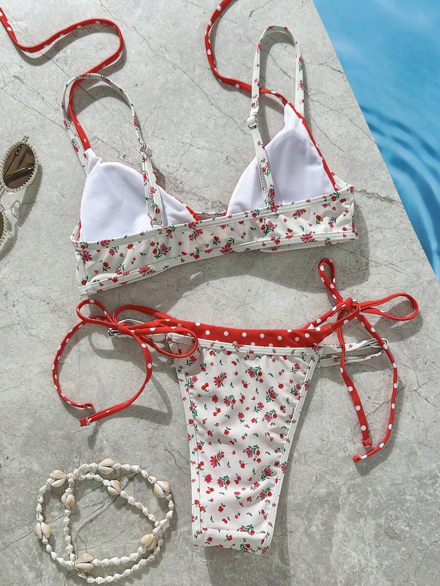 Women's retro polka dot high waist bikini swimsuit set with spaghetti straps and knot tie-back top.