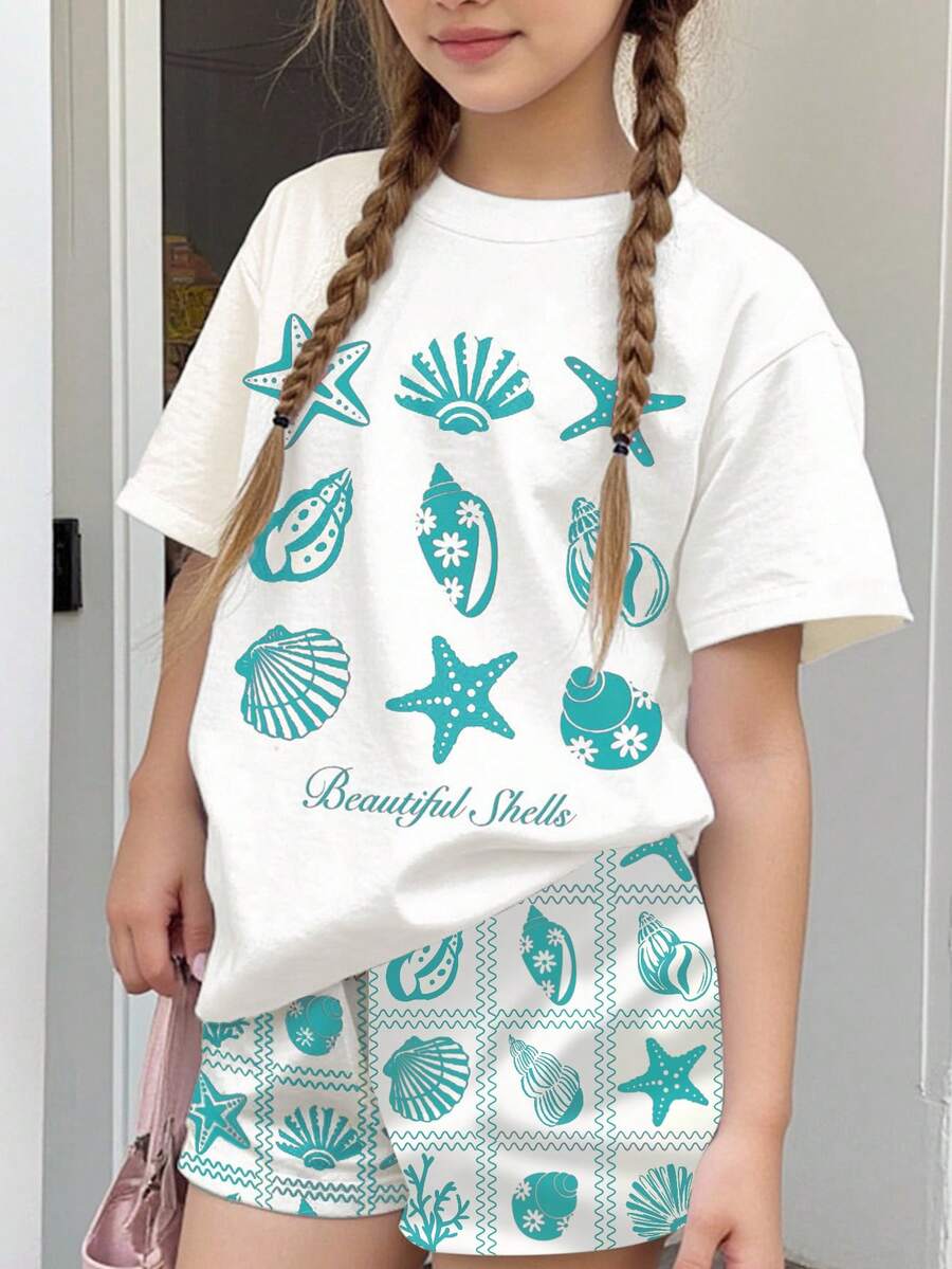 Tween girls 2-piece summer casual outfit featuring a multicolor seashell print short sleeve T-shirt with drop shoulders and matching loose fit shorts with pockets.