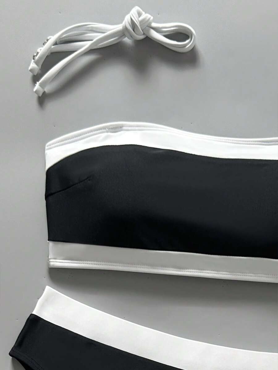 Women's bandeau bikini swimwear set featuring detachable shoulder straps, removable padding, wireless cups, and low-waist bottoms.