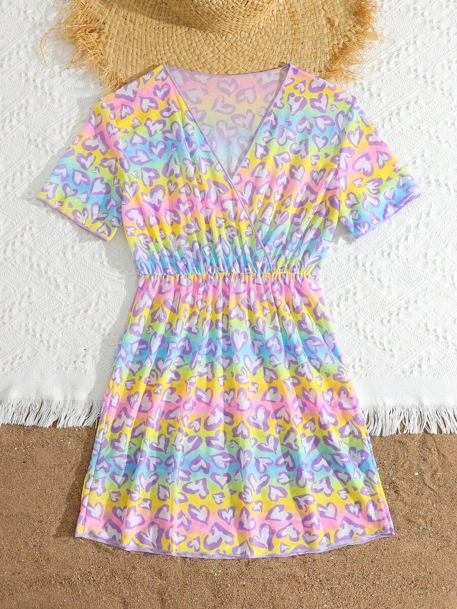 Multicolor heart print long cover up dress for tween girls featuring a V-neck criss-cross wrap front and short sleeves.