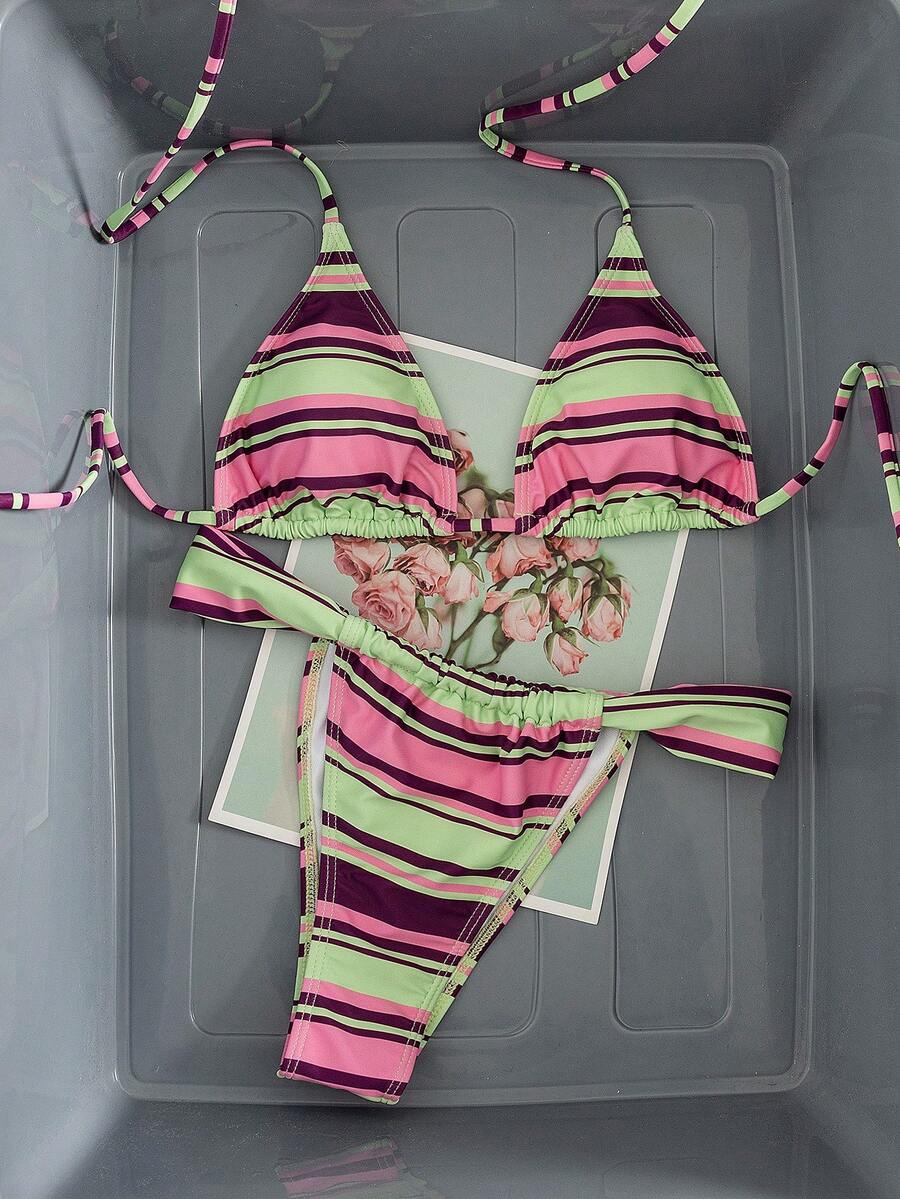 Women's striped halter two-piece swimsuit featuring a lace-up triangle top with removable padding and high-cut low-waist bikini bottoms.