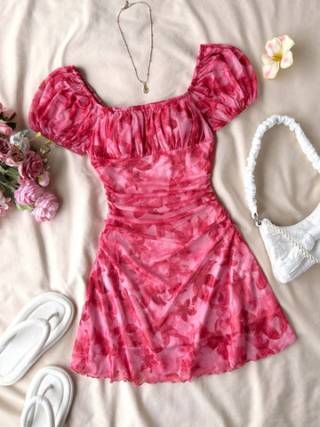Teen girls red floral print A-line party dress featuring short puff sleeves, square neckline, ruched bust, and contrast lace details.