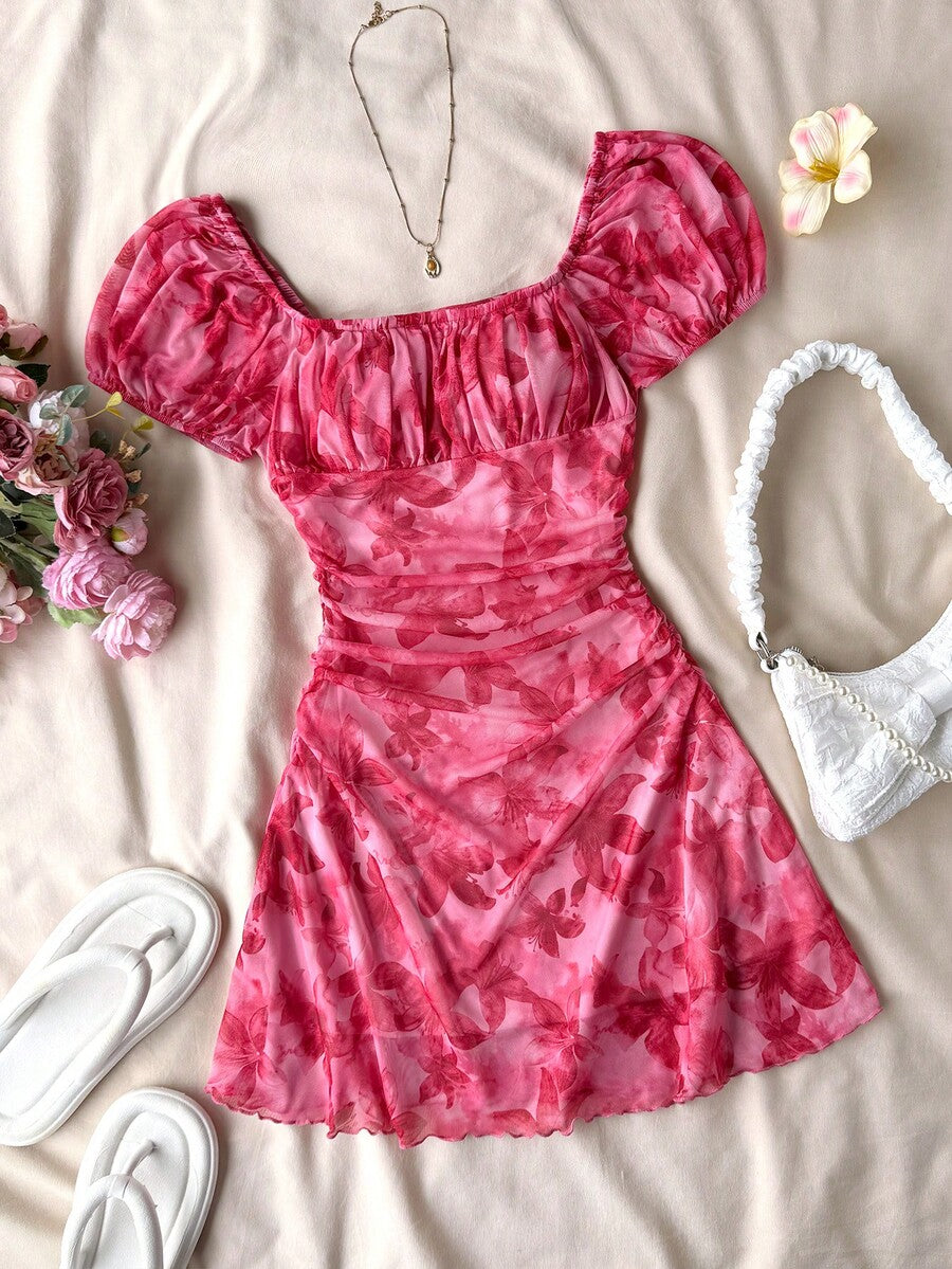 Teen girls red floral print A-line party dress featuring short puff sleeves, square neckline, ruched bust, and contrast lace details.