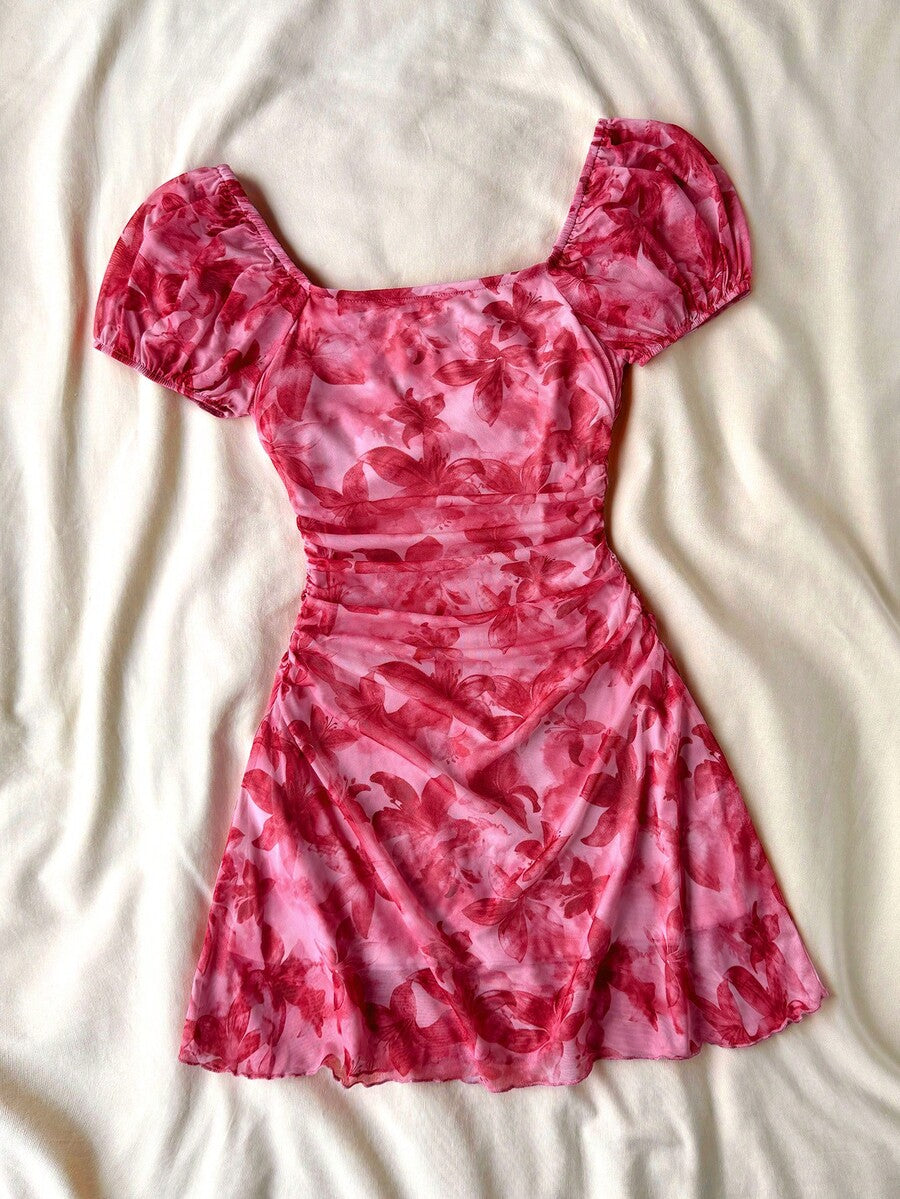 Teen girls red floral print A-line party dress featuring short puff sleeves, square neckline, ruched bust, and contrast lace details.