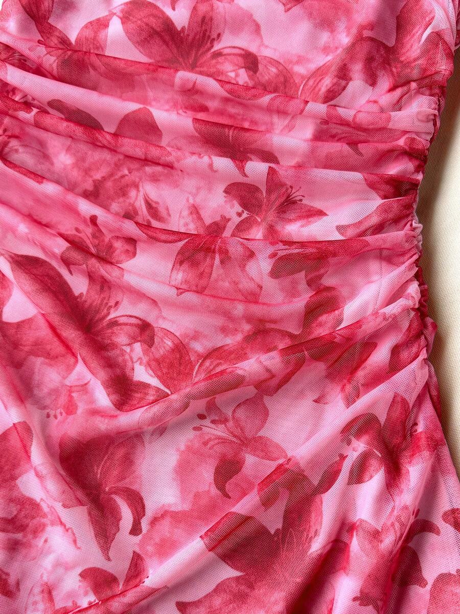Teen girls red floral print A-line party dress featuring short puff sleeves, square neckline, ruched bust, and contrast lace details.