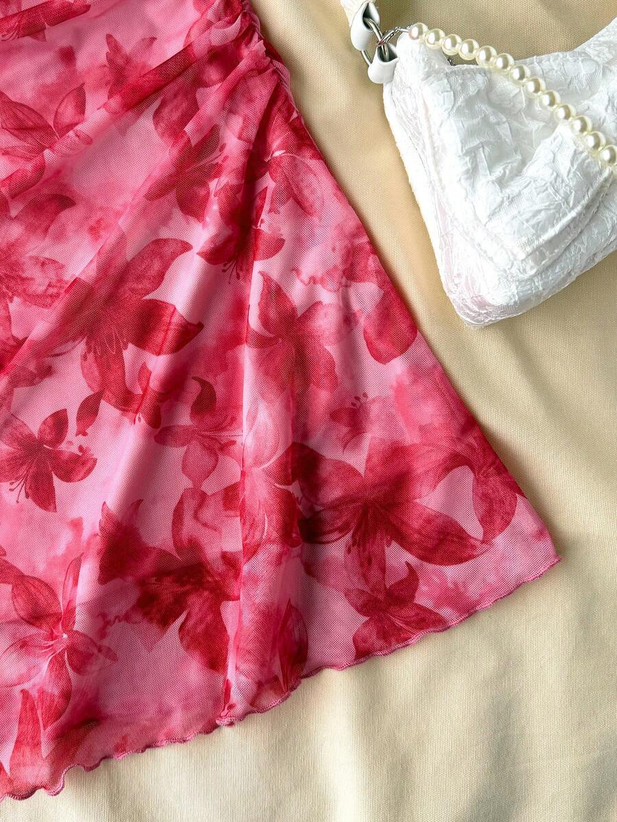 Teen girls red floral print A-line party dress featuring short puff sleeves, square neckline, ruched bust, and contrast lace details.