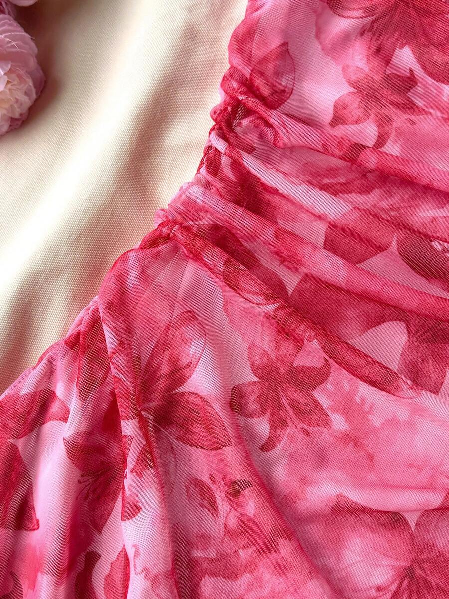 Teen girls red floral print A-line party dress featuring short puff sleeves, square neckline, ruched bust, and contrast lace details.